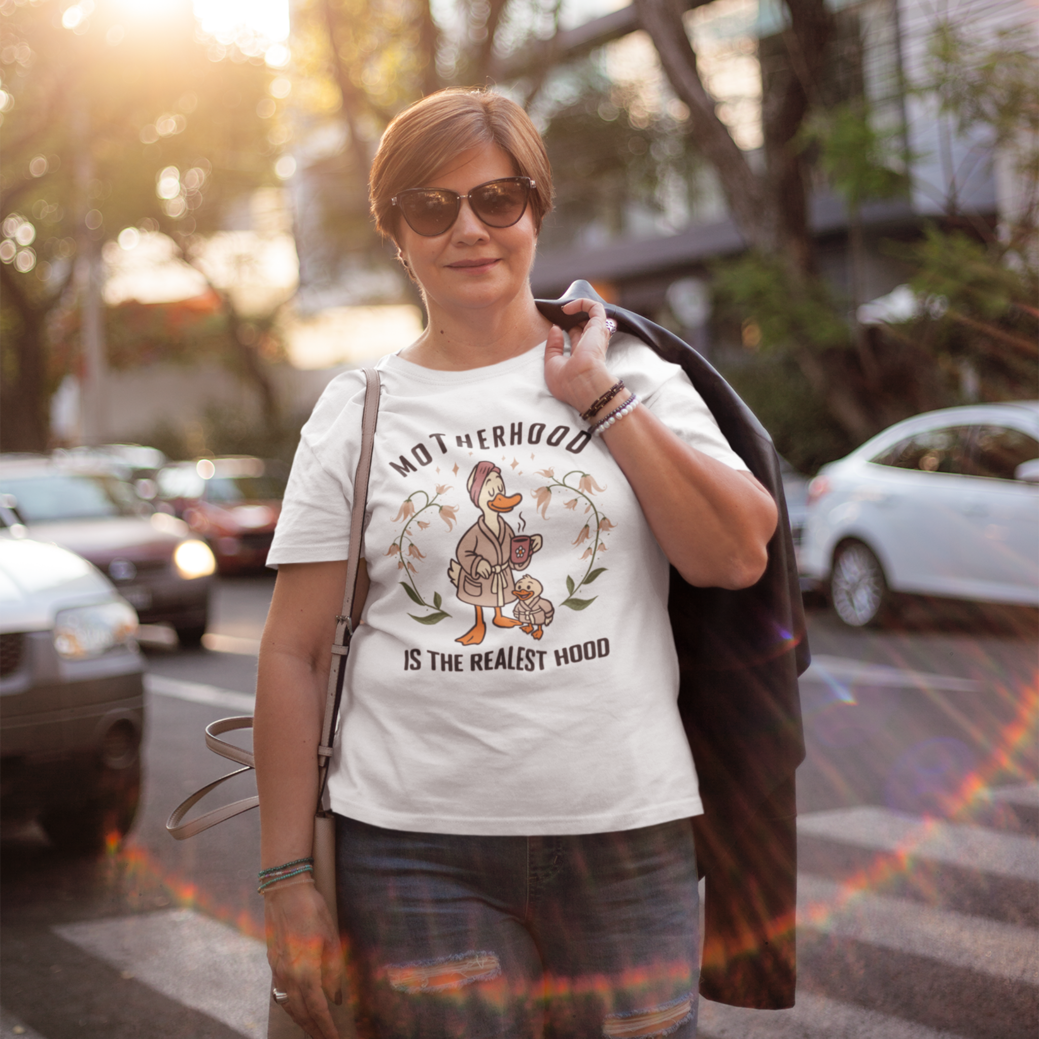 Motherhood Is The Realest Hood Tee